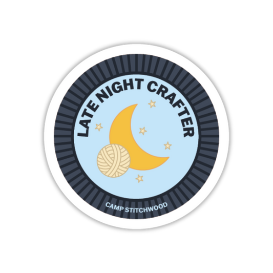 Circular sticker with 'Late Night Crafter' text, yarn ball, and moon design on a light blue background.