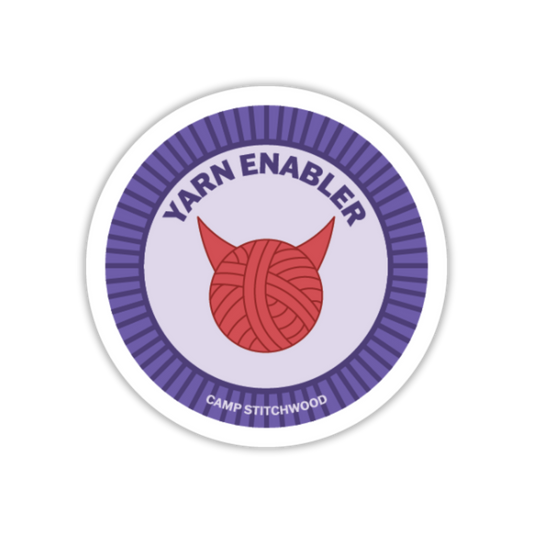 Circular sticker with a red yarn ball and 'Yarn Enabler' text on a white background