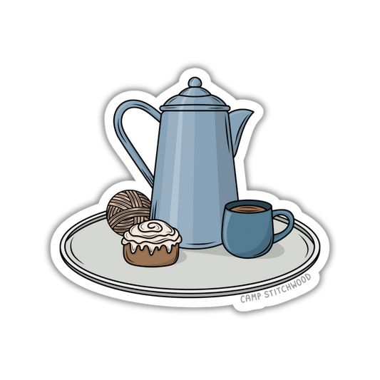Illustration of a blue teapot, cup, and pastry on a white background with 'Camp Stitchwood' branding.