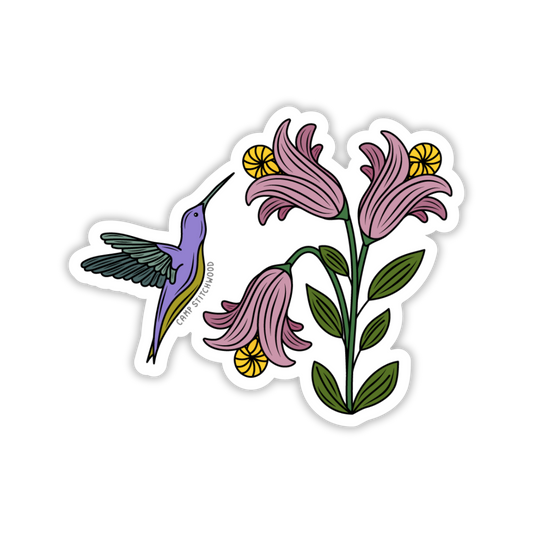 Sticker of a hummingbird and flowers on a white background