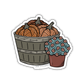 Sticker with yarn ball pumpkins in a basket and a small pot of flowers