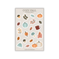 Sticker sheet with fall-themed designs on a beige background