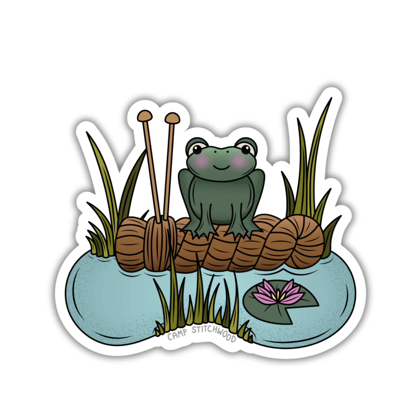 Sticker of a frog sitting on a hank of yarn with grass and water in the background