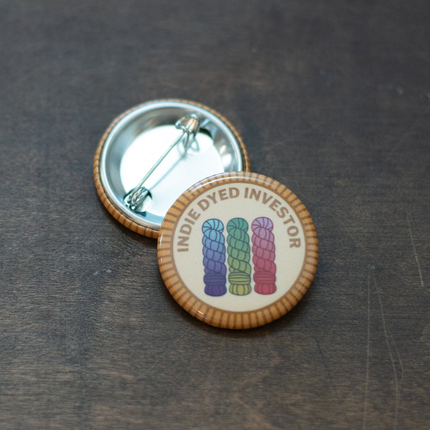 Indie Dyed Investor badge on an upside down badge
