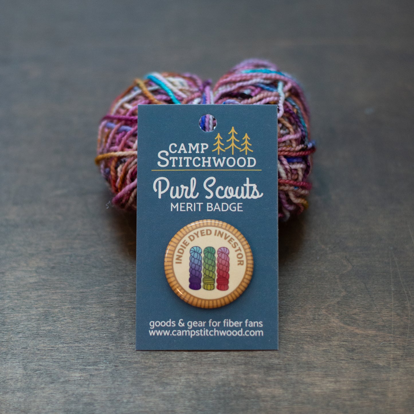 Indie Dyed Investor badge on a card stock backer