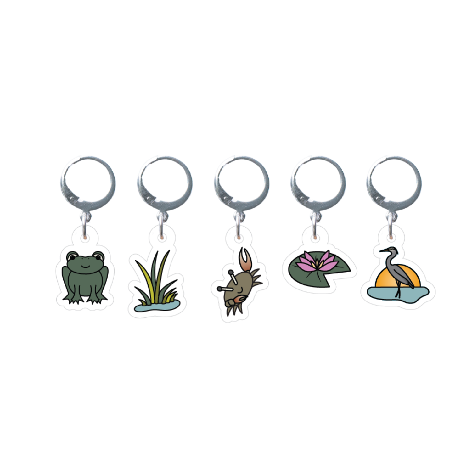 Set of five stitch markes with frog, grass, crab, lily pad, and heron designs on a white background.