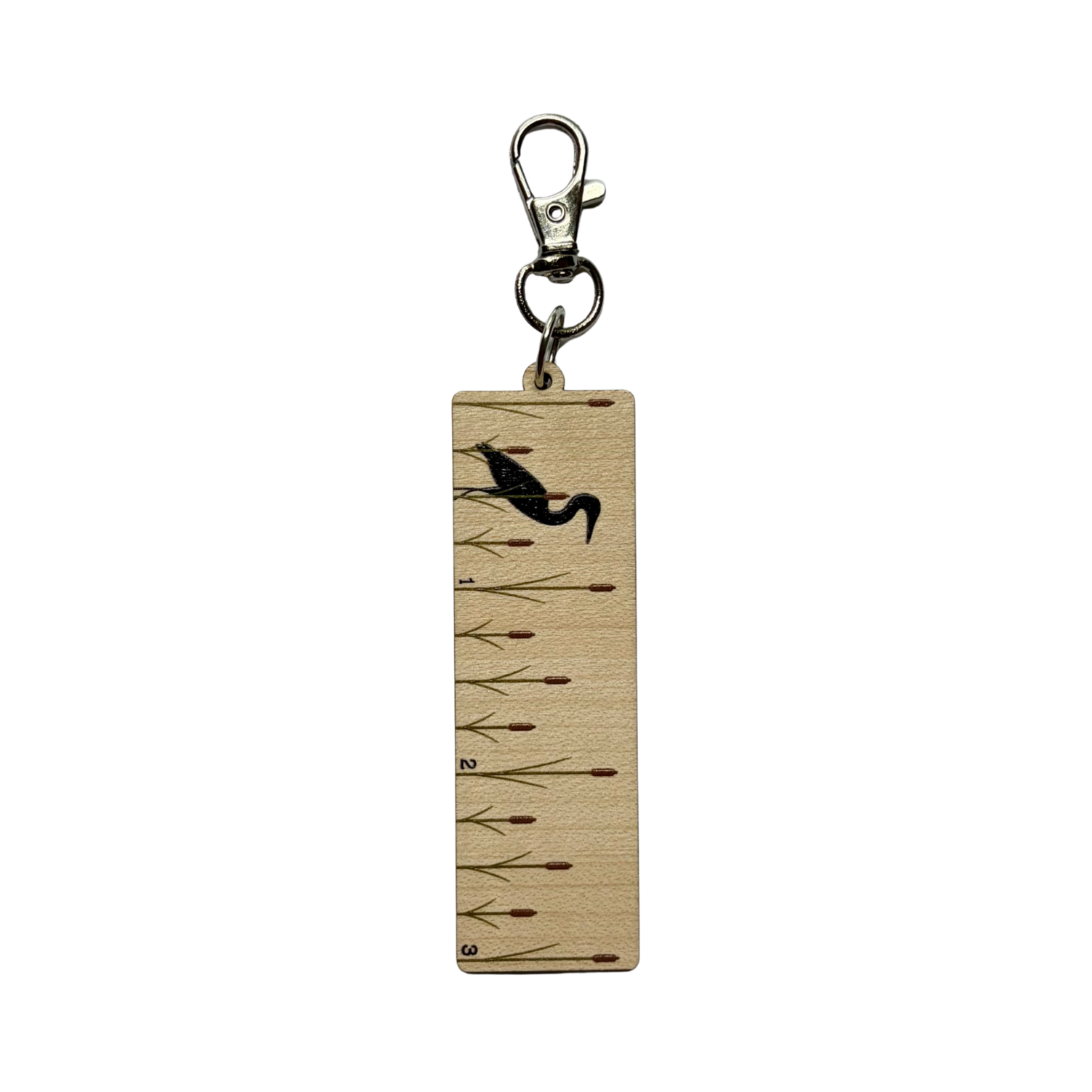 Clip on ruler with a design of heron and cattails
