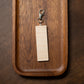 Wooden clip on tool  on a wooden surface