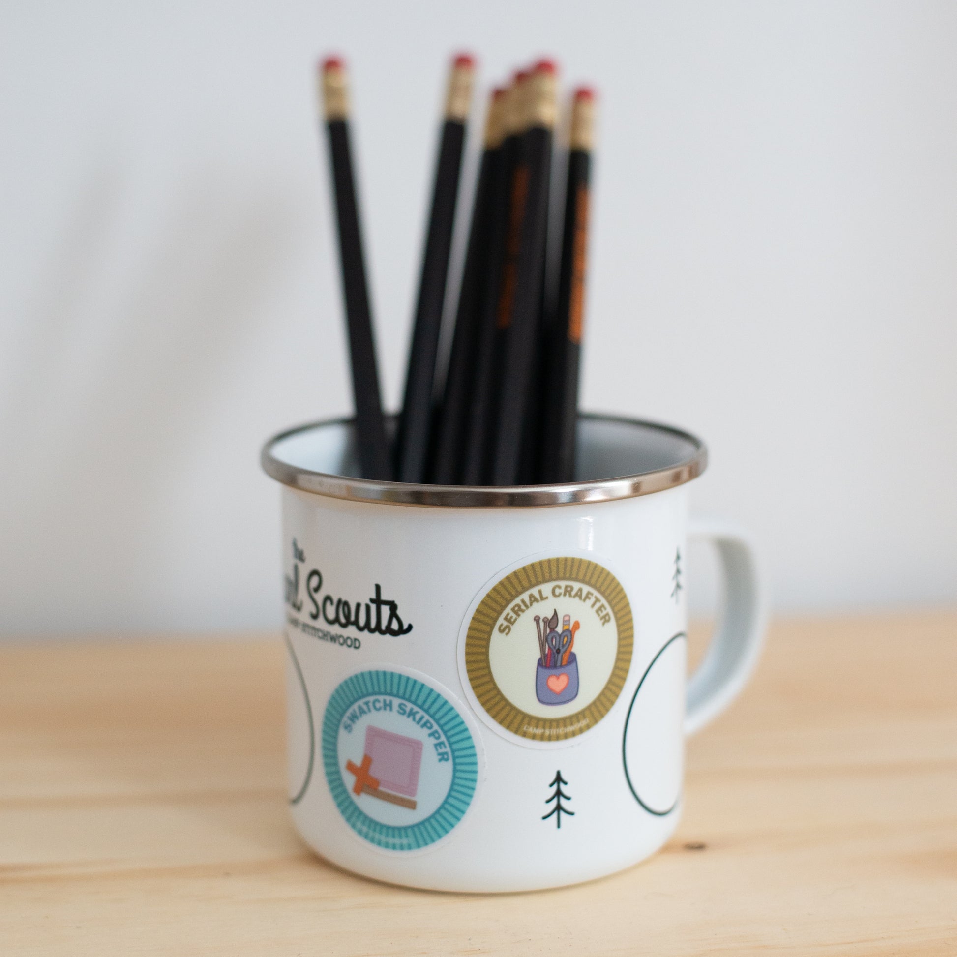 The Purl Scouts Camp Mug with pencils in it