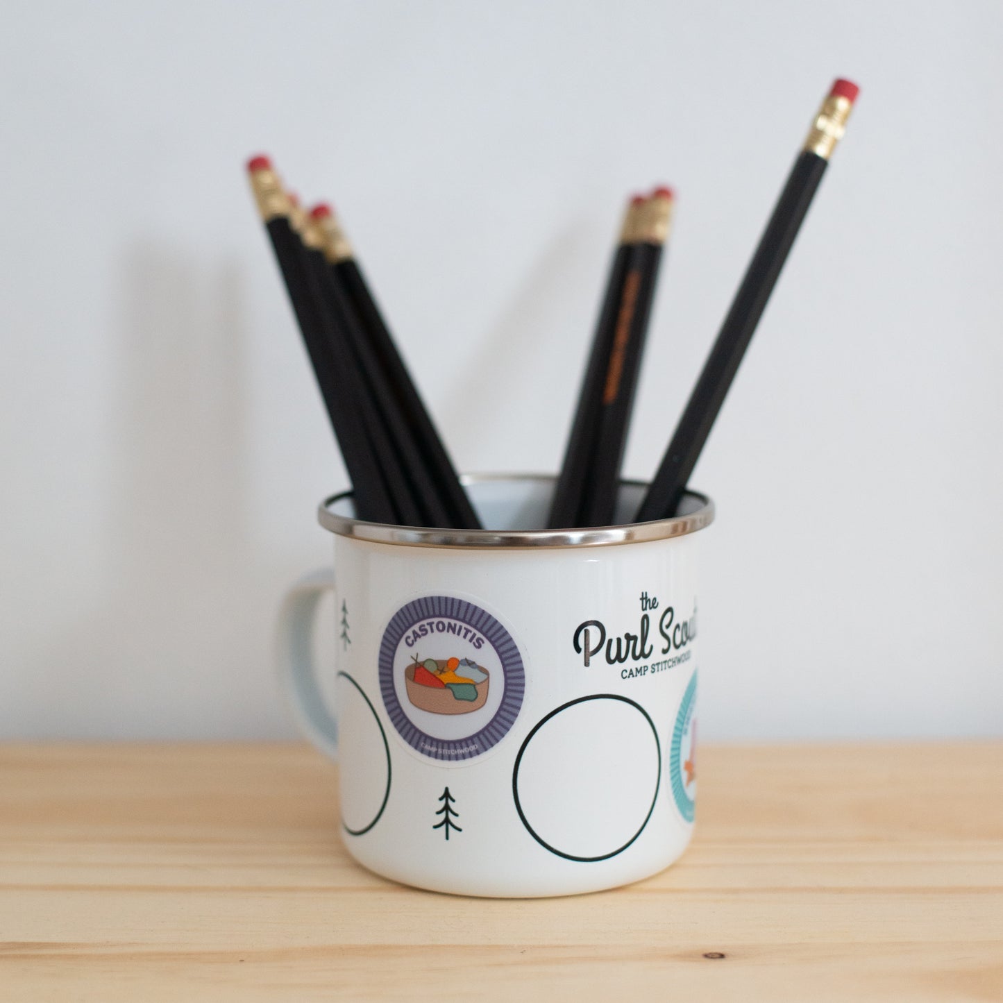 The Purl Scouts Camp Mug with pencils in it