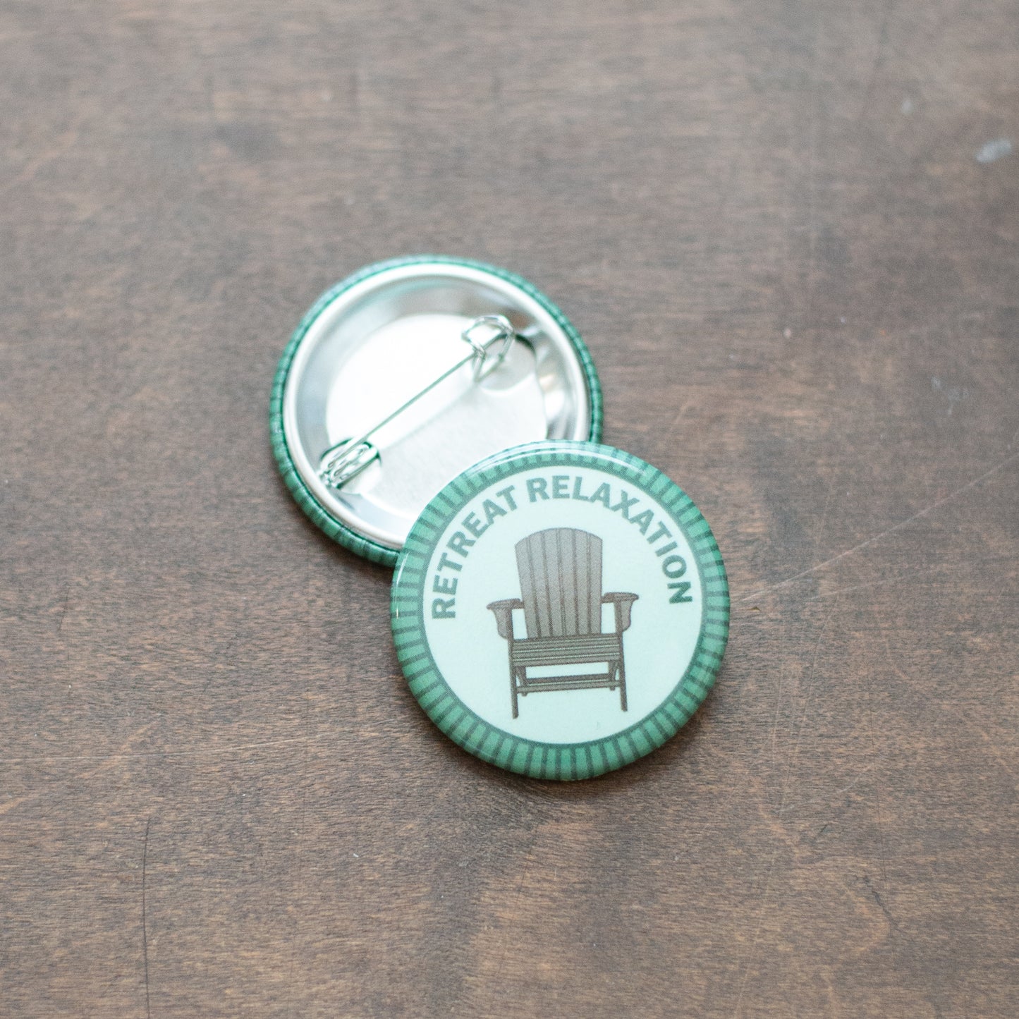 Retreat Relaxation badge on top of an upside down badge