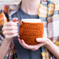 Mug cozy knitting pattern with button